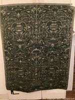 Full front view of the hand painted woven tapestry showing overall pattern and size