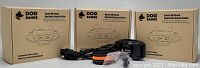 Three boxed Dog Range Smart No Shock Dog Bark Control Collar sets with accessories and collars displayed in front.