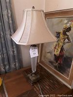 Full view of lamp showing shade, glass body and marble base