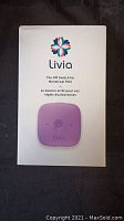 Front of the Livia box showing the product and main branding information.