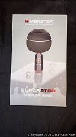 Front of Monster Super Star Microphone box showing microphone image and branding.