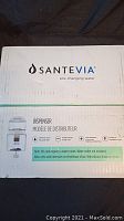 Closed box showing Santevia branded packaging with model type and instructions printed.