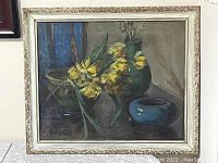 Front view of framed oil painting showing floral still life
