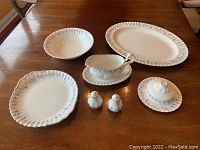 Full view of all seven pieces on table