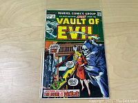 Full front cover of Vault of Evil #2 comic showing title, characters, and story teaser 'The Hour of the Witch!' with bright colors and detailed illustration.