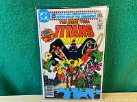 Front cover view showing entire comic book in protective sleeve on green background