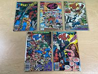 Six Marvel What The ?! comic books laid out showing front covers, issues 3,4,5,7,8 visible clearly along with issue 2