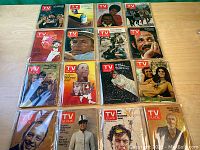 Overview photo showing 15 vintage TV Guide magazines arranged in rows on a wooden surface. Covers feature various celebrities and TV-related imagery from different eras.