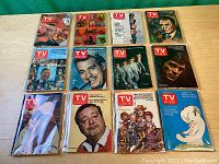 Twelve vintage TV Guide magazines arranged in three rows showing cover artwork of various TV personalities, puppets, and animated characters.