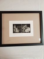 Framed black and white print artwork with matte border showcasing two panels and signed by Waloski