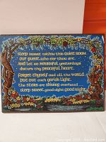 Front view of wood plaque showing colorful painted poem and nature scene