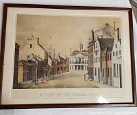 Framed vintage print featuring an old street scene with Federal Hall at the center, showing buildings on both sides detailed in neutral tones.