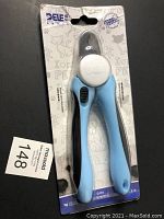 Blue-handled pet nail clippers and trimmer with safety stop in original sealed packaging.