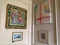 Photo showing four artworks: top left a Masonite painting of two dancers with a foam frame, bottom left small print of a reclining figure, top right abstract painting on canvas with pastel colors