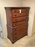 Front view of full highboy dresser showing all five drawers
