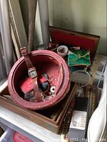 Round red leather jewelry box and contents
