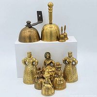 All 10 bells, various sizes and designs, displayed together with white background.