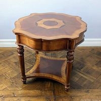 Side-angle view showing entire table with top and lower shelf