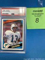 Front of the 1984 Topps Dan Marino football card in PSA slab showing player image and grade label.