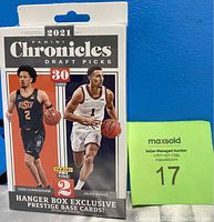 Front view of the sealed box showing Cade Cunningham and Jalen Suggs. Box states 30 cards and exclusive hanger box prestige base cards.