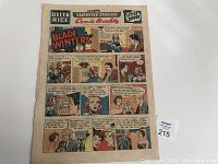 Full front view of the comic weekly newspaper page showing the Blade Winters comic story and minor edge wear.