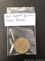 Reverse view showing stylized portcullis design and year 1960.