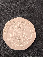 Reverse side of 1982 Twenty Pence coin with crowned Tudor rose and denomination