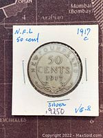 Front of the 1917 Newfoundland silver 50 cents coin showing denomination and year