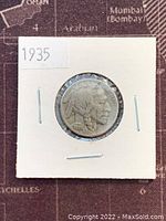 Obverse side of 1935 Buffalo Nickel showing Native American profile and date 1935