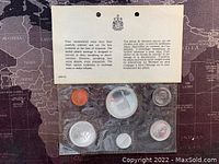 Set of six 1967 Canadian coins sealed in plastic packaging with front side showing animal designs and denominations.