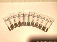 Top view of 10 Shiseido Bio-Performance serum tubes arranged in a fan with front side showing brand and product name.