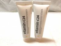 Front view of two white tubes labeled 'vitamin C24', 1.0 US FL. oz (30ml) each