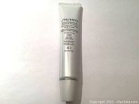 Front view of the tube showing product name, SPF 43, and usage details.