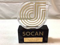 Front view of SOCAN trophy showing full logo and plaque on black base.