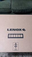 Top view of the large cardboard box with LENOX branding, indicating the blade is new and boxed.