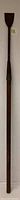 Full length view of the antique forged iron flensing spade with wooden handle.