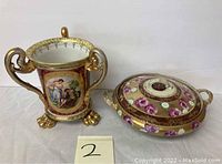 Royal Vienna lion footed vase and Nippon casserole side view