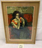 Framed lithograph under glass with mat and gold metal frame