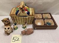 Full lot overview showing all items including cookie jar, owls, ducks, hippo, and sauce dishes
