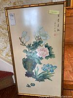 Full view of framed silk painting showing floral arrangement and calligraphy