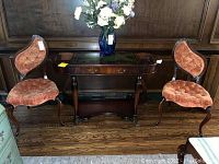 Front view of both chairs showing overall design, color and condition