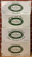 Photo of original Bearington Collection boxes labeled Sandra, Betsy and Ross, Mrs. Knitter and Pearl, and Victoria.