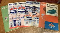 Group of 7 Standard/American Oil branded road maps for Nebraska, Wyoming, Minnesota, Milwaukee, Kentucky, Tennessee, and New Jersey.