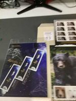 Set of three Canadian mint stamp sheets including bears, Apollo 11, and British Columbia 150 years.