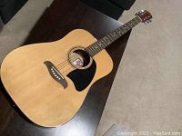 Oscar Schmidt natural finish acoustic guitar body and neck