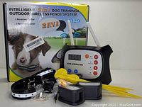 Photo of the dog training and outdoor wireless fence system components with packaging box showing product name and features