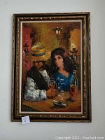 Full view of the framed painting showing a man and woman seated at a bar, the man holding a glass and the woman looking towards him, set against warm, textured background colors.