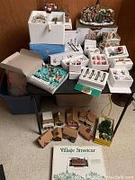 Full view including multiple village components and card table