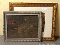 Both framed artworks displayed side by side