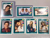 Front sides of eight Full House themed trading cards showing color images of the cast members and the Laffs logo.